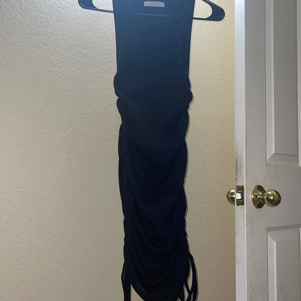 Discovery Clothing Black Tank Top dress . Never Worn